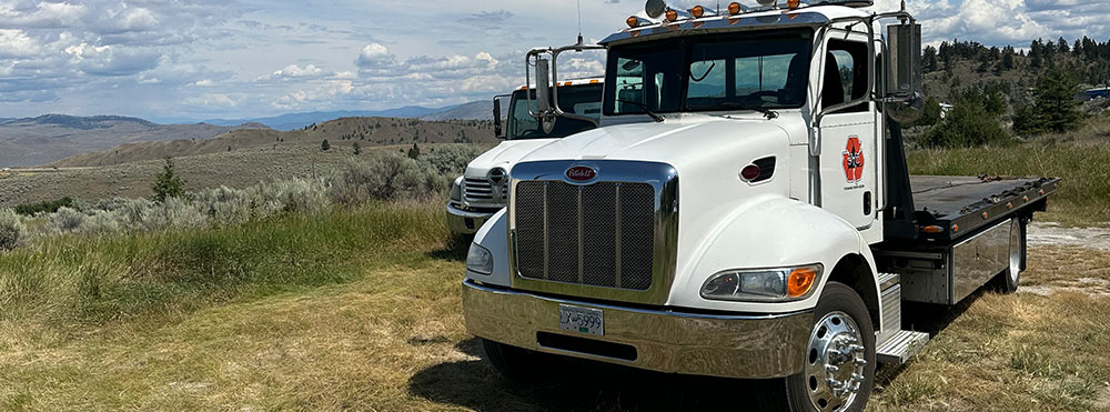 Scrap Your Car flat deck tow trucks in the BC Interior